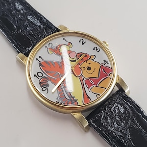1990s Unisex Timex gold tone Quartz Disney Winnie-the-Pooh black Leather strap