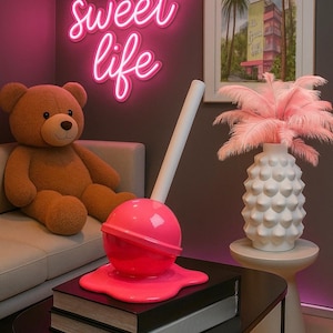 Oversized Melted Lollipop Sculpture | Modern Pop Art Candy Decor in Rainbow Colors