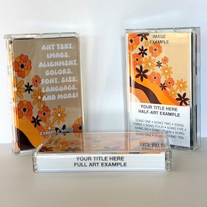 May include: Three clear plastic cassette tape cases with custom printed inserts. The left case features orange and brown flowers with text reading ANY TEXT, IMAGE, ALIGNMENT, COLORS, FONT, SIZE, LANGUAGE, AND MORE! The right and front cases show floral patterns and text including YOUR TITLE HERE HALF-ART EXAMPLE and YOUR TITLE HERE FULL ART EXAMPLE.