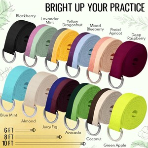 Könnte beinhalten: Eine Auswahl an Yogagurten in verschiedenen Farben, darunter Schwarz, Lavendel, Gelb und Grün. Jeder Gurt ist aufgerollt und hat einen Metall-D-Ring. Der Text "BRIGHT UP YOUR PRACTICE" steht oben, mit Längen von 183, 244 und 305 cm.