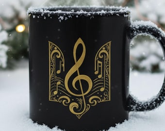 Taza Tryzub de música ucraniana: clave de sol dorada y notas musicales en tridente ucraniano, taza de café de cerámica negra (325 ml/444 ml), regalo para músicos.