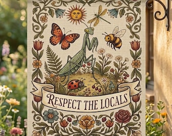 May include: A beige garden flag featuring a detailed illustration of insects and flowers. A butterfly, dragonfly, bee, ladybug, and praying mantis are depicted. The words "Respect the Locals" are written on a banner.