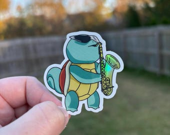 Water Turtle | Squirtle Saxophone Holographic Sticker, 2” x 2.2”