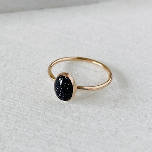 Stargazer ring, blue goldstone ring, gold oval stone ring, gold filled stacking band, celestial jewelry. SALE!