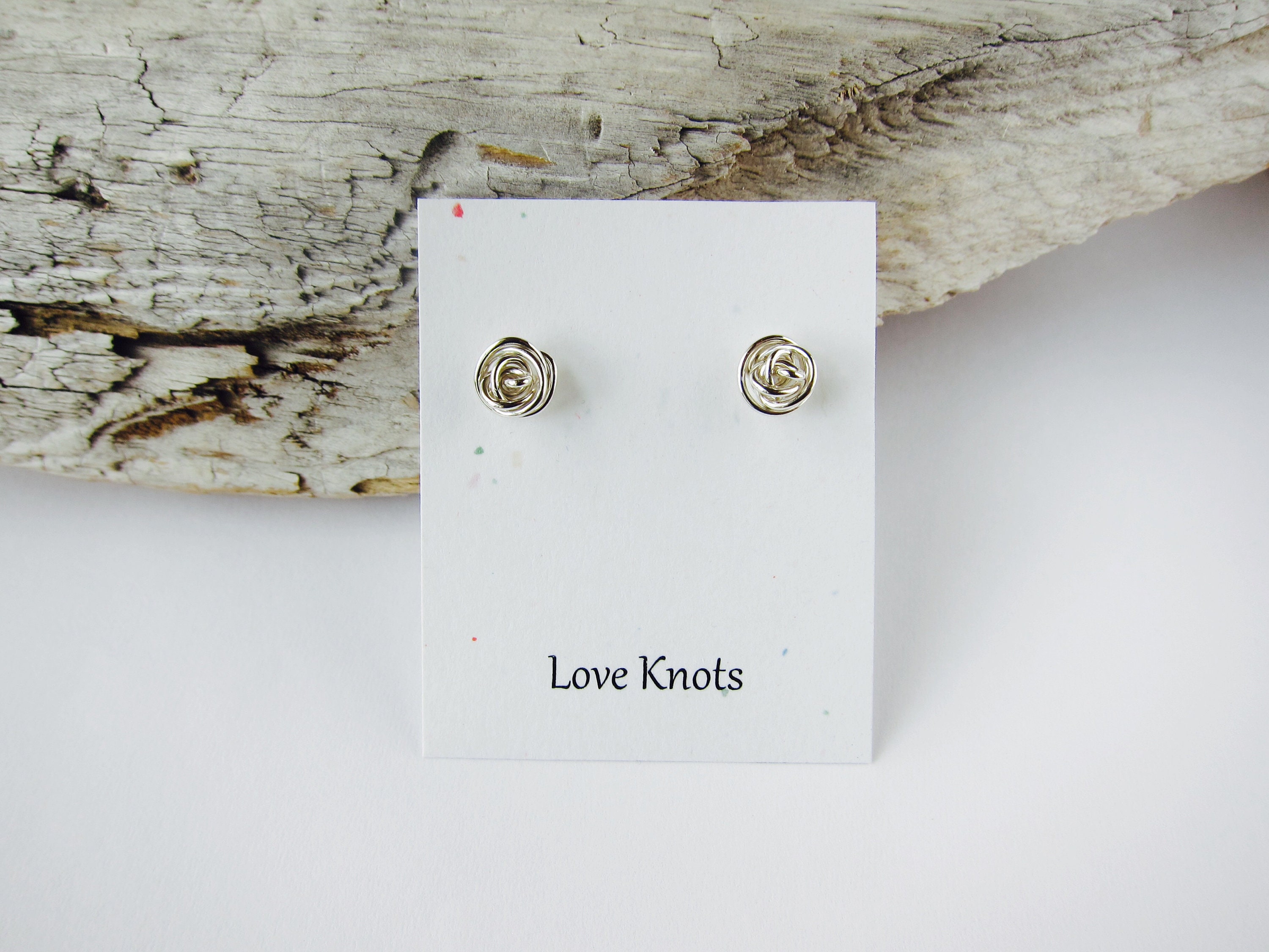 Love knots earrings. Sterling silver studs, tie the knot, wedding, br…