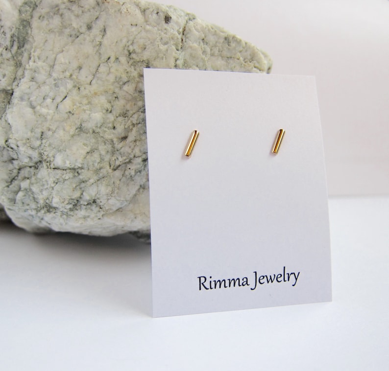 14k gold studs bar posts dash earings modern and dainty. Gold line earrings minimal