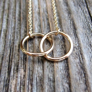 Linked circles necklace. Interlocking infinity circle necklace.