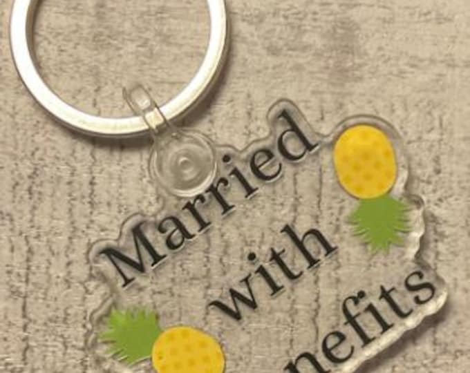 Keychain, Married with Benefits includes two pineapples