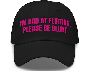 Bold Statement Pink Font – “I’m Bad at Flirting Please Be Blunt” – Sarcastic Ball Cap – Blunt Humor Gift –Adjustable strap w/ antique buckle