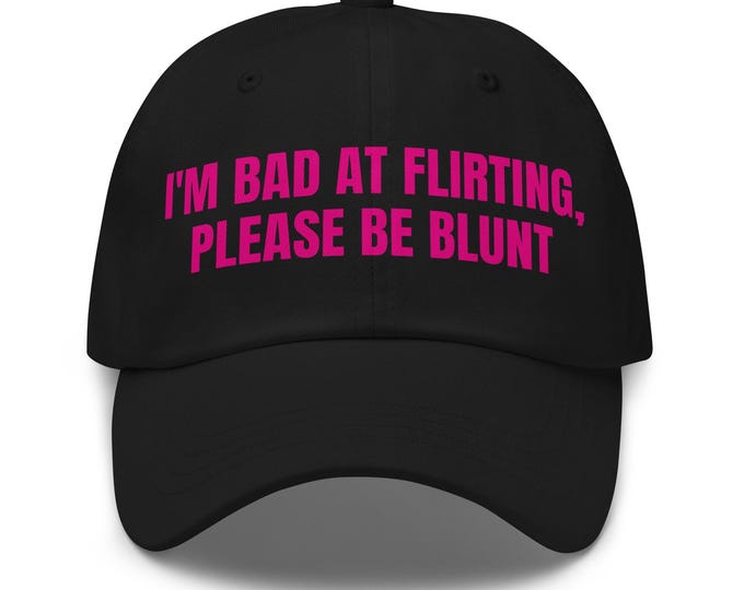 Bold Statement Pink Font – “I’m Bad at Flirting Please Be Blunt” – Sarcastic Ball Cap – Blunt Humor Gift –Adjustable strap w/ antique buckle