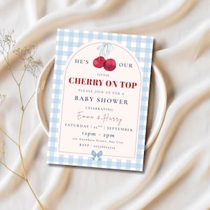 May include: A baby shower invitation with a light blue gingham pattern border. The invitation features the text "He's Our Little Cherry on Top" and details for the event, including the names Emma & Harry, date, time, and RSVP information. The design includes watercolor cherries.