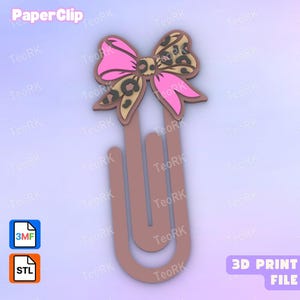 Pode incluir: Um clip de papel em forma de laço rosa e com estampa de leopardo. O clip de papel é castanho e tem o texto "Paper Clip" no topo. A imagem também inclui o texto "3D PRINT FILE".