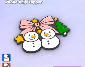 May include: A 3D print file for a badge reel or phone grip topper featuring two white snowmen with orange noses, a large light pink bow, a green Christmas tree, and small yellow stars on a black base, labeled Badge Reel Topper / Phone Grip Topper.