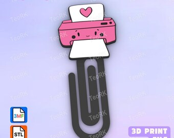 May include: A black paperclip with a pink printer topper featuring a white sheet of paper with a pink heart. The printer has a cartoon face with black eyes and a small smile. The image includes text reading PaperClip, 3MF, STL, and 3D PRINT FILE.