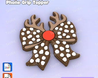 May include: A brown bow-shaped badge reel or phone grip topper featuring reindeer antlers at the top, a central red circle, and white polka dots across the surface. The image includes the text Badge Reel Topper / Phone Grip Topper and 3D Print File.