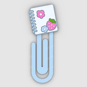May include: A light blue paperclip-style bookmark with a white notepad design. The notepad features a pink flower, a strawberry, and a blue flower. The bookmark is a cute and functional accessory for books and journals.