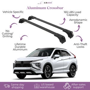 May include: A white SUV with black wheels and a black roof, featuring a black aluminum crossbar. The crossbar is vehicle-specific, has an aerodynamic shape, and anti-theft locks. It is made of durable aluminum and can hold up to 165 lbs.