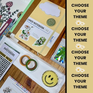 May include: A collection of stationery items including a yellow A5 lined notebook with a cloud-shaped sticker, washi tape, stickers, and a white pencil case with a smiley face patch. The text "CHOOSE YOUR THEME" is visible.