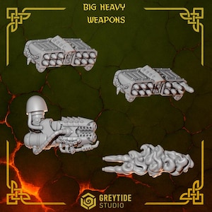May include: Four gray miniature weapons are displayed against a dark green background with a cracked texture and decorative gold corners. The weapons include missile launchers and a large gun, with the text "BIG HEAVY WEAPONS" at the top.