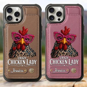 May include: Two phone cases with a brown and pink leather-like finish. Each case features a cartoon chicken wearing pink glasses. The text "Crazy Chicken Lady" and the name "Jessica" are printed on the cases.