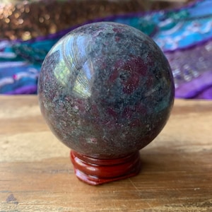 Ruby Kyanite Sphere 59mm with Wood Stand
