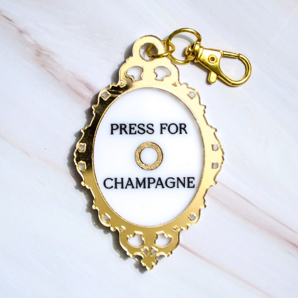 Press for champagne keychain | gold and white champagne button key chain