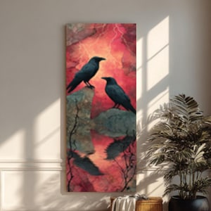 May include: A vertical canvas art piece featuring two black crows perched on a rock formation against a vibrant red and orange background. The artwork has a dramatic, gothic aesthetic, with a hint of a stormy sky.