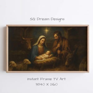 Puede incluir: Una obra de arte enmarcada que representa la escena de la Natividad. La imagen muestra a María y José con el niño Jesús en un pesebre, rodeados de animales. La obra de arte está en un marco de madera, con el texto "SG Dream Designs" y "Instant Frame TV Art 3840 X 2160".