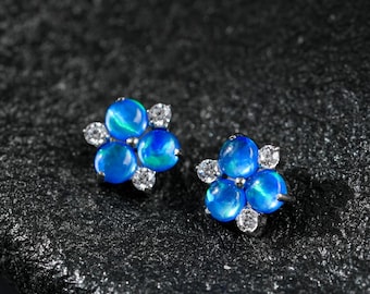 18G/16G Titanium Labret oorbel met Australische opaal en bloemmotief • Oorbel in de conch/tragus/helix/kraakbeen/neus • Platte achterkant met schroefdraad aan de binnenzijde • Oorbel met schroefsluiting
