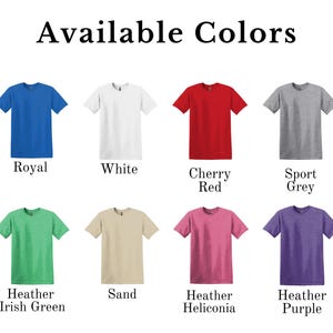 May include: Image displaying eight t-shirts in various colors: royal blue, white, cherry red, sport grey, heather irish green, sand, heather heliconia, and heather purple. Text above reads "Available Colors".