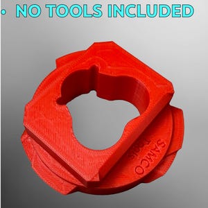 May include: A bright red, 3D-printed tool with a unique geometric design. The tool has a circular shape with a square outer edge and a central opening. The text "SAMCO Tools" is visible on the side. The text "NO TOOLS INCLUDED" is at the top.