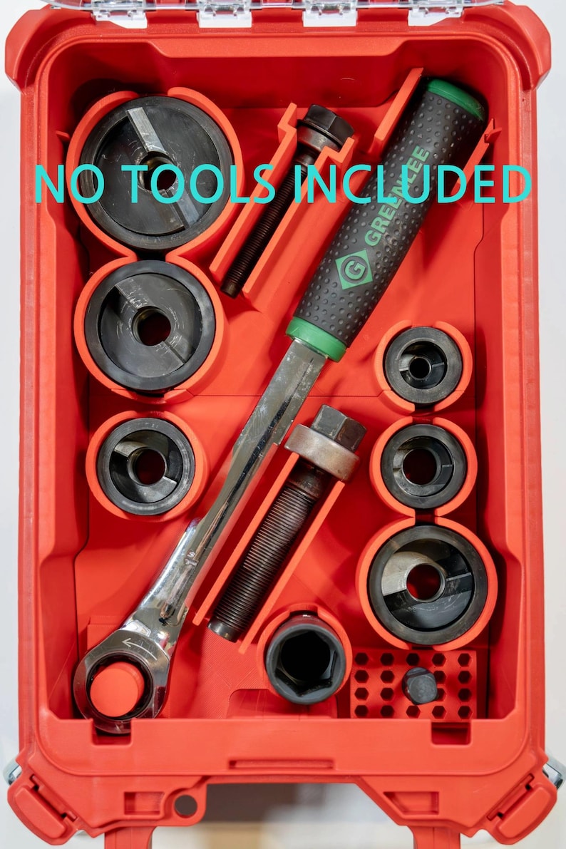 May include: Red tool case with various black tools and a silver wrench. The case has the text "NO TOOLS INCLUDED" in turquoise. The tools are arranged in a structured layout within the case.