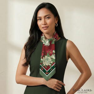 May include: A dark olive green sleeveless dress paired with a pointed neck scarf featuring a deep red background, white and green chrysanthemum floral patterns, and a geometric green and white border. The text SeaClaire copyright 2026 is visible.
