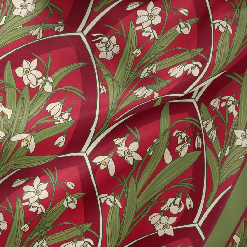 May include: A fabric pattern featuring a repeating geometric design of deep red, shield-shaped segments. Each segment contains detailed illustrations of white snowdrop flowers with green stems and leaves, arranged in a dense, botanical layout.