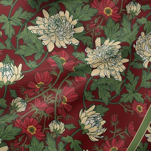 May include: A fabric pattern featuring large cream-coloured chrysanthemums and smaller red flowers with yellow centres, set against a deep red background. The design includes detailed green foliage and stems, creating a dense floral botanical print.