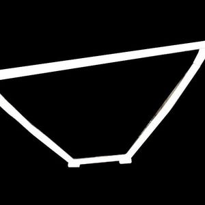 May include: A white metal pull-up bar featuring a long horizontal top tube with two angled support braces extending downward to a shorter horizontal base bar, designed for mounting to a wall or door frame for upper body strength training.