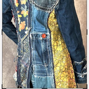 May include: A patchwork denim jacket with various fabric panels. The jacket features a mix of blue denim, floral, and patterned fabrics. It has a button closure and frayed edges, creating a unique, artistic look.