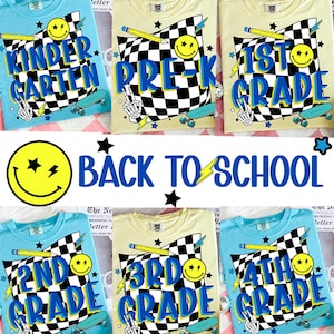 May include: A collection of light blue and cream-colored t-shirts with grade level graphics. Each shirt features a checkered flag design, a smiley face, a pencil, and a skateboard. The text on the shirts reads "Kindergarten", "Pre-K", "1st Grade", "2nd Grade", "3rd Grade", and "4th Grade".