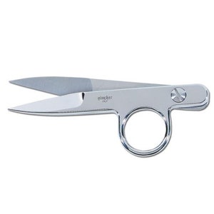 May include: Silver-toned fabric scissors with a single ring handle. The scissors are labeled "gincher" and "F.A.I."
