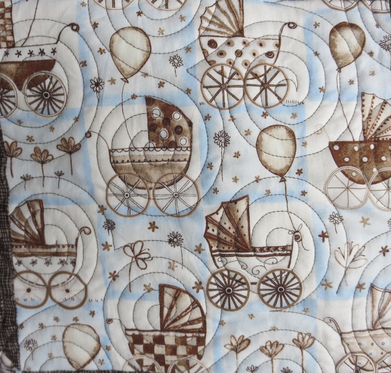 Homemade Pale Blue And Brown Baby Quilt