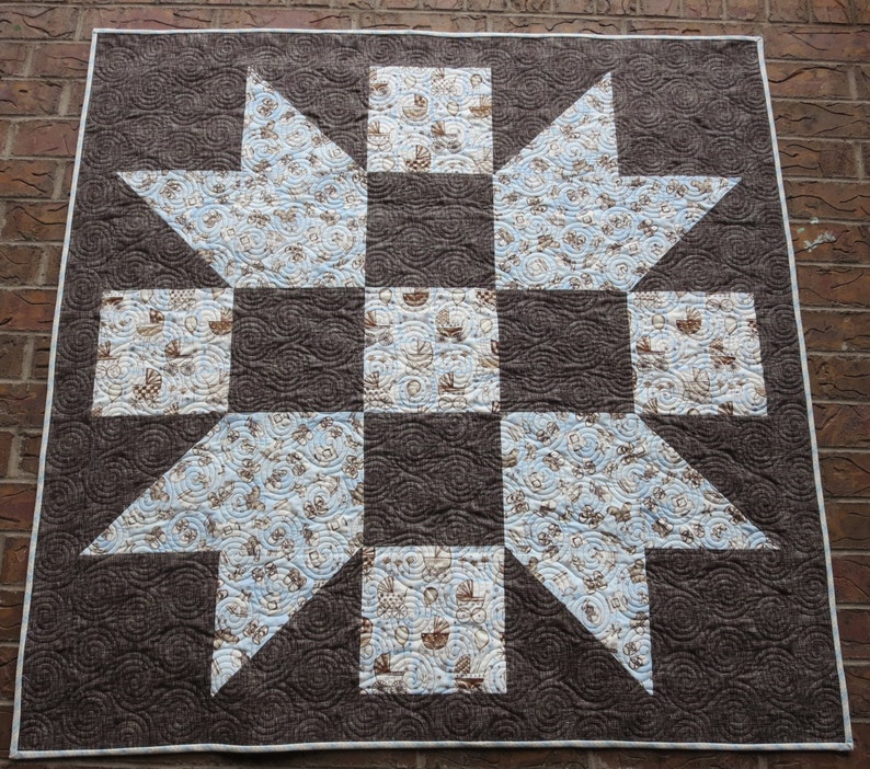 Homemade Pale Blue And Brown Baby Quilt
