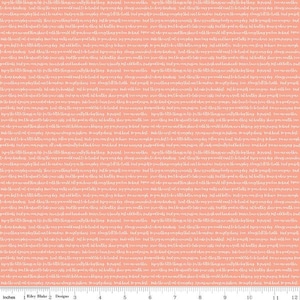 May include: Peach-colored fabric with a repeating pattern of white text. The text appears to be a script or a handwritten font. The fabric is measured in inches.