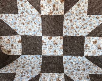 Homemade Pale Blue And Brown Baby Quilt