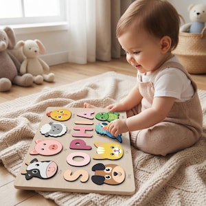 May include: Wooden puzzle featuring the name "SOPHIA" with animal-shaped pieces. The puzzle includes a chicken, sheep, pig, cow, turtle, bird, cat, and dog. The puzzle is on a light-colored wooden board.