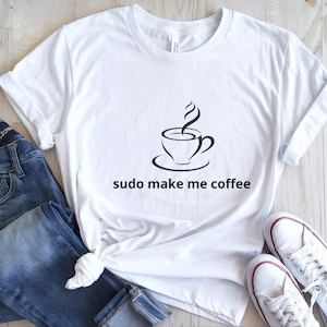 May include: A set of three ceramic mugs with a speckled, matte finish. The mugs are in shades of cream, light grey, and dark grey. Each mug has a simple, minimalist design, ideal for coffee or tea.