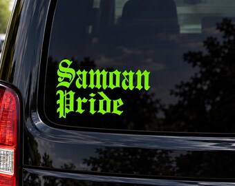 May include: A bright neon green vinyl decal applied to a dark vehicle rear window. The decal features the text "Samoan Pride" written in a bold, stylised gothic font, with the word "Samoan" positioned directly above the word "Pride".