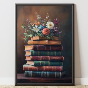 May include: A framed art print depicting a pile of old books adorned with a colourful floral arrangement. The books have leather covers in brown, green, and burgundy hues. The flowers include roses, daisies, and other blooms in various colours.