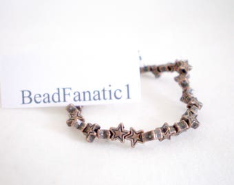 5mm Tiny Celestal Stars Antiqued Goldtone Metalized Metallic Beads