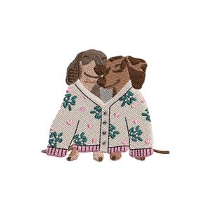 May include: An embroidered design featuring two dachshund dogs snuggled together. They are wearing a cream-colored sweater adorned with pink hearts and green floral accents. The sweater has a pink ribbed trim.