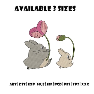 May include: An embroidered design featuring two cartoon rabbits holding flowers. The larger rabbit is gray, and the smaller one is beige. The flowers are pink and green. Text at the top reads "AVAILABLE 3 SIZES".